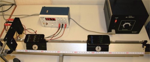 A quantitative analysis of coupled oscillations using mobile accelerometer sensors