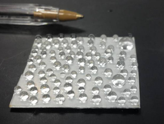 Atmospheric rf plasma deposition of superhydrophobic coatings using tetramethylsilane precursor