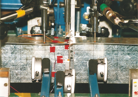 Experimental determination of critical loads in thin-walled bars with Z-section subjected to warping torsion
